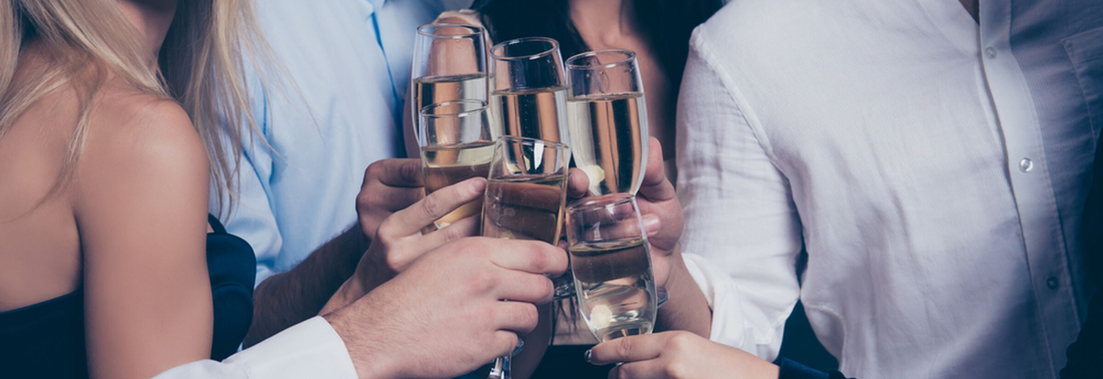 Adults toasting with champagne glasses